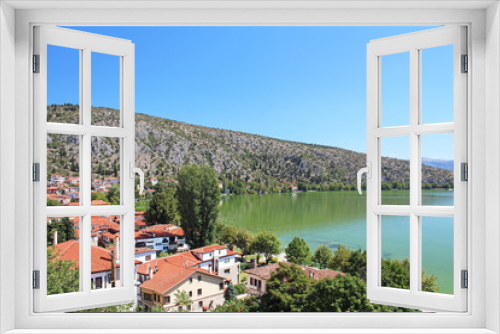 Fototapeta Naklejka Na Ścianę Okno 3D - Stone traditional houses and lake Orestiada in Kastoria city  (Epirus, Greece)
