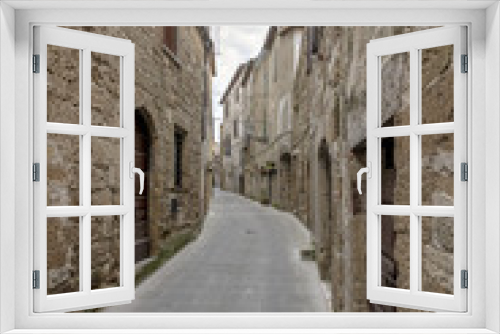 Fototapeta Naklejka Na Ścianę Okno 3D - A typical narrow alley in the historic center of Pitigliano, Grosseto, Tuscany, Italy