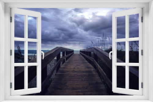 Fototapeta Naklejka Na Ścianę Okno 3D - Beach entrance on a cloudy day