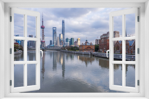Fototapeta Naklejka Na Ścianę Okno 3D - River And Modern Buildings Against Sky in Shanghai,China.