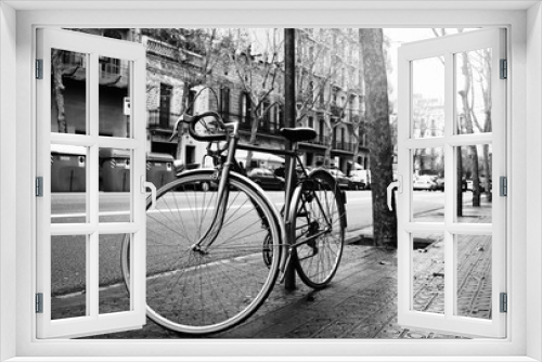 Fototapeta Naklejka Na Ścianę Okno 3D - Old vintage style bicycle parking with locked by a big chain and key