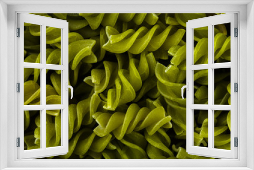 Fototapeta Naklejka Na Ścianę Okno 3D - Background of colorful pasta texture close-up. Assortment of colorful macaroni. italian pasta. Variety of types and shapes of dry Italian pasta. Full background of dry uncooked macaroni.