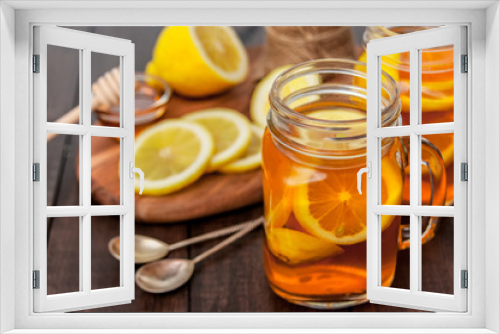 Fototapeta Naklejka Na Ścianę Okno 3D - Hot tea with lemon and natural honey, good treat to have vitamins and strong immunity.