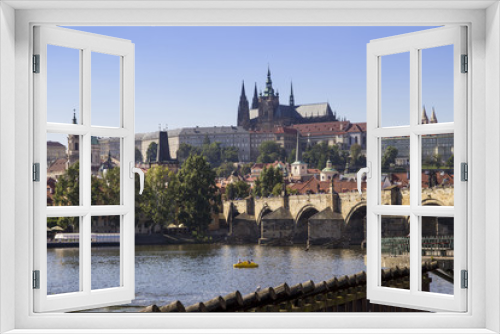 View of Prague castle and Charles Bridge with river Vlatva