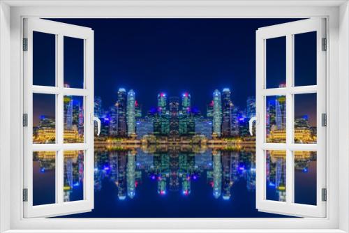 Fototapeta Naklejka Na Ścianę Okno 3D - Singapore city skyline and view of skyscrapers around Marina Bay at night