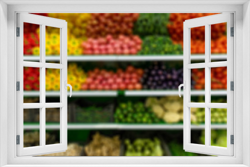 Fototapeta Naklejka Na Ścianę Okno 3D - Fresh organic Vegetables and fruits on shelf in supermarket, farmers market. Abstract blurred supermarket aisle with colorful shelves and unrecognizable customers as background
