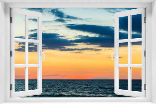 Fototapeta Naklejka Na Ścianę Okno 3D - Sunset over the beach of ocean
