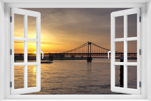 Fototapeta Naklejka Na Ścianę Okno 3D - Sonnenaufgang an der Uerdinger Rheinbrücke