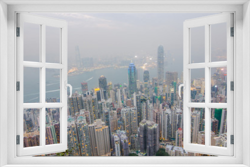 Hong Kong the scenes, victoria harbour from the peak bird view, in the mist with bad weather in the evening, nimbus landscape on the trails