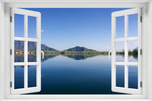Fototapeta Naklejka Na Ścianę Okno 3D - Mirrored reflection of mountains and lake