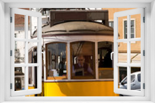Fototapeta Naklejka Na Ścianę Okno 3D - Historic trolley car in downtown Lisbon, Portugal