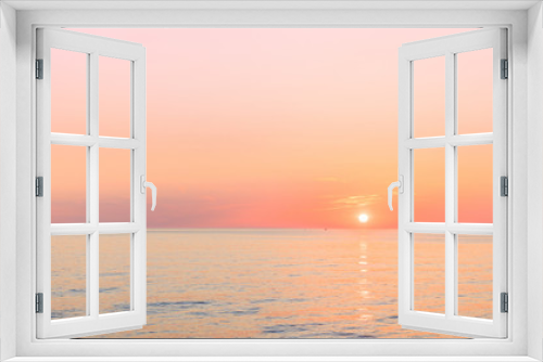 Fototapeta Naklejka Na Ścianę Okno 3D - Sun Is Setting On Horizon At Sunset Sunrise Over Sea Or Ocean.