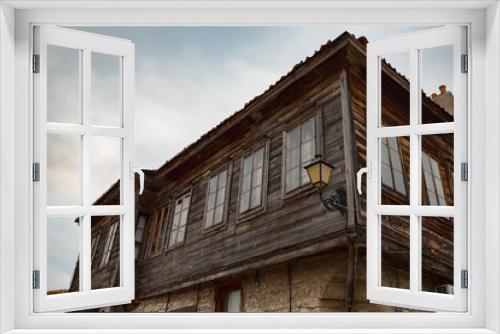Fototapeta Naklejka Na Ścianę Okno 3D - Old Bulgarian houses in the town of Nesebar, Bulgaria. In 1956 Nesebar was declared as museum city, archaeological and architectural reservation by UNESCO.