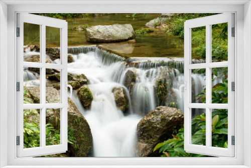 Fototapeta Naklejka Na Ścianę Okno 3D - Beautiful view of waterfall landscape. Small waterfall in deep green forest scenery