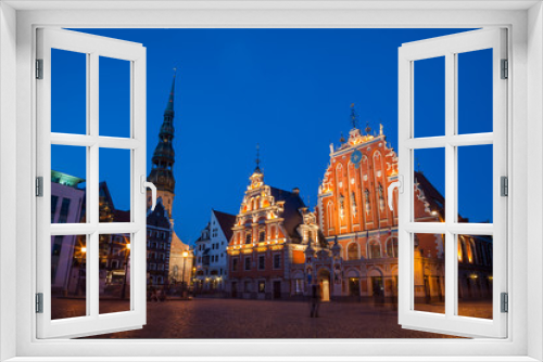 Fototapeta Naklejka Na Ścianę Okno 3D - RIGA, LATVIA - 12 JUN 2016: City Hall Square with House of the Blackheads and Saint Peter church in Old Town at evening