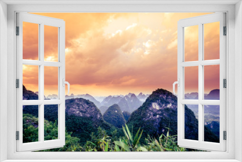 Fototapeta Naklejka Na Ścianę Okno 3D - Sunset over karst landscape by Yangshuo in China