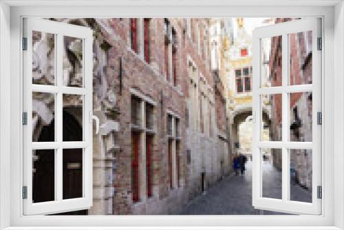 Fototapeta Naklejka Na Ścianę Okno 3D - Architecture of narrow bicked street of Brugge town in Begium