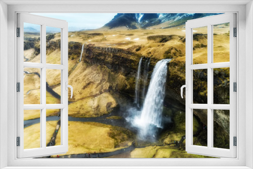 Fototapeta Naklejka Na Ścianę Okno 3D - Aerial view of famous Seljalandsfoss is one of the most beautiful waterfalls on the Iceland. It is located on the South of the island.