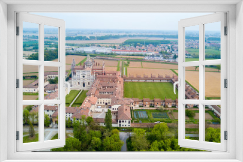 Fototapeta Naklejka Na Ścianę Okno 3D - Vista aerea della Certosa di Pavia, costruita alla fine del XIV secolo,  campi e chiostro del monastero e santuario in provincia di Pavia, Lombardia, Italia