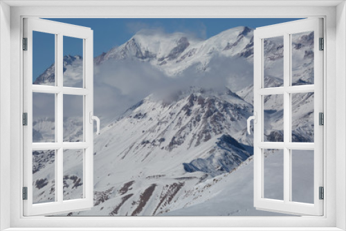 Fototapeta Naklejka Na Ścianę Okno 3D - Beautiful winter landscape with snow-topped mountains. Ski resort