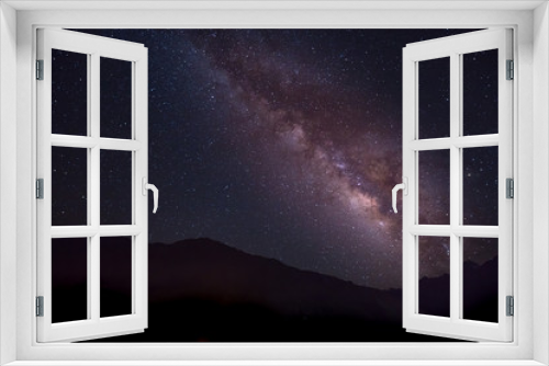 Fototapeta Naklejka Na Ścianę Okno 3D - Milky way over mountain