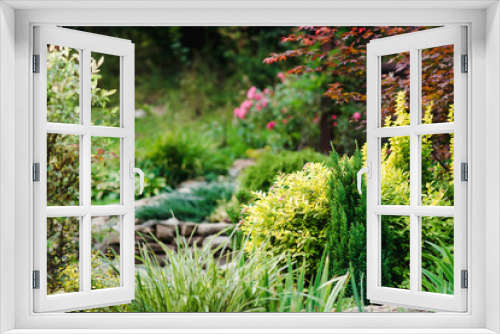 Fototapeta Naklejka Na Ścianę Okno 3D - Beautiful landscaping in home garden.