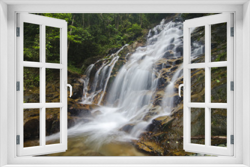 Fototapeta Naklejka Na Ścianę Okno 3D - beautiful in nature Kanching Waterfall located in Malaysia, amazing cascading tropical waterfall. wet and mossy rock, surrounded by green rain forest