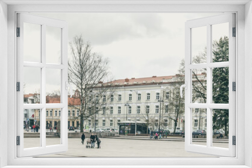 Fototapeta Naklejka Na Ścianę Okno 3D - People walking on  Cathedral square in  Vilnius Lithuania