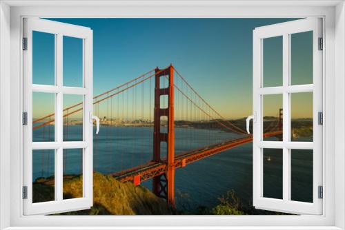 Fototapeta Naklejka Na Ścianę Okno 3D - Aerial view of the Golden Gate Bridge in San Fransisco at golden hour