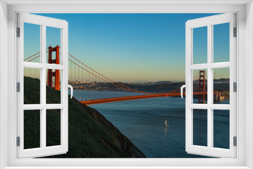 Fototapeta Naklejka Na Ścianę Okno 3D - Aerial view of the Golden Gate bridge in San Fransisco during golden hour