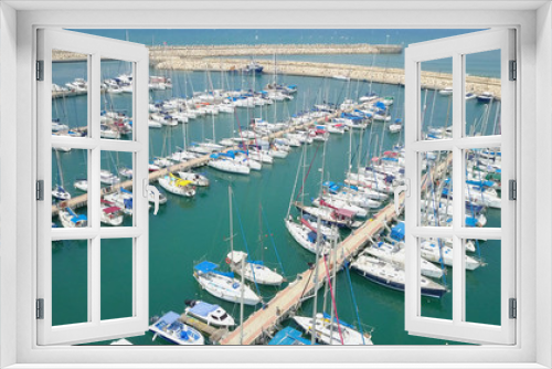 Fototapeta Naklejka Na Ścianę Okno 3D - Large marina with various Yachts and boats - Aerial image