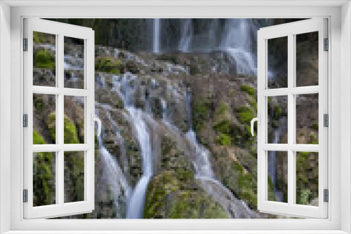 Fototapeta Naklejka Na Ścianę Okno 3D - Waterfall on a mountain stream