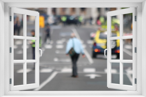 Blurred People walking in the street