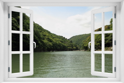 Fototapeta Naklejka Na Ścianę Okno 3D - ボートから眺める嵐山の大堰川