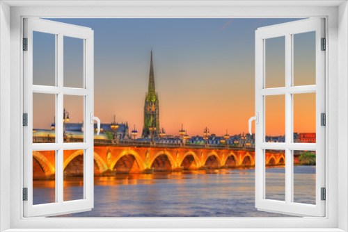 Fototapeta Naklejka Na Ścianę Okno 3D - Pont de Pierre bridge and Saint Michel Basilica in Bordeaux, France
