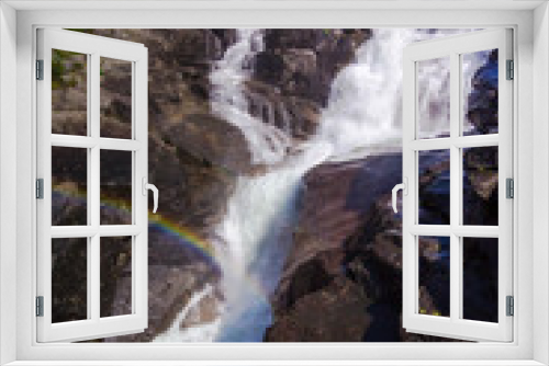 Fototapeta Naklejka Na Ścianę Okno 3D - Rainbow and waterfall in the mountains valley in Norway