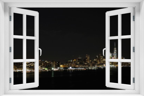 Fototapeta Naklejka Na Ścianę Okno 3D - New York skyline at night from New Jersey