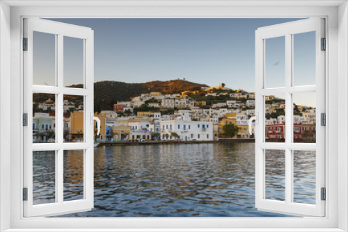 Fototapeta Naklejka Na Ścianę Okno 3D - View of the seafront of Agia Marina village on Leros island in Greece early in the morning. 
