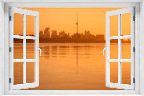 Fototapeta Naklejka Na Ścianę Okno 3D - View of lake Ontario & Toronto city during sunrise