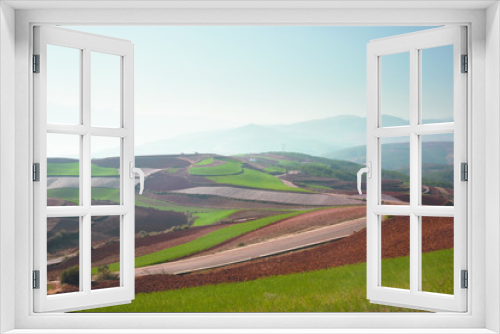 Fototapeta Naklejka Na Ścianę Okno 3D - Panoramic view of chinese agriculture landscape with mountains and hills in the morning.