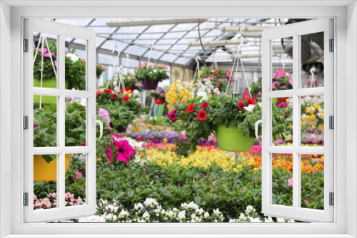 Fototapeta Naklejka Na Ścianę Okno 3D - interior of a large greenhouse with sale of plants and flowers i