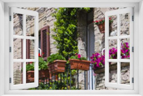 Fototapeta Naklejka Na Ścianę Okno 3D - Flowering Balcony in Assisi, Italy