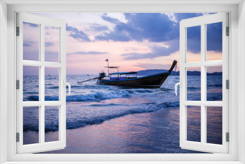 Fototapeta Naklejka Na Ścianę Okno 3D - Longtail boat on sunrise.