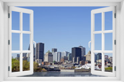 Fototapeta Naklejka Na Ścianę Okno 3D - View of Montreal city with reflection on the water, day