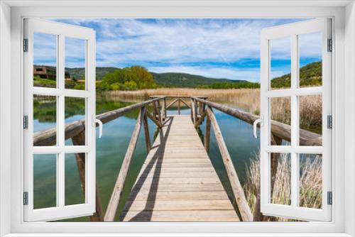 Fototapeta Naklejka Na Ścianę Okno 3D - Timber footpath over lake Una,Spain