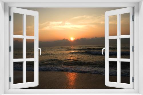 Fototapeta Naklejka Na Ścianę Okno 3D - silhouettes on beach at sunrise