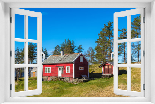 Fototapeta Naklejka Na Ścianę Okno 3D - Red farm house in Norway