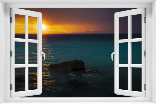 Fototapeta Naklejka Na Ścianę Okno 3D - 
Sunset seen from the shore of the ocean