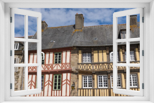 Fototapeta Naklejka Na Ścianę Okno 3D - Typical construction of the French Breton region, mezzanine facade.