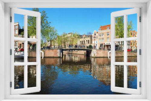Fototapeta Naklejka Na Ścianę Okno 3D - Häuser an Gracht in Amsterdam als Panorama